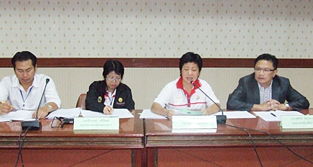Deputy Mayor Wutisak Rermkitkarn (right) leads a committee working with local charities to assist low-income youths.